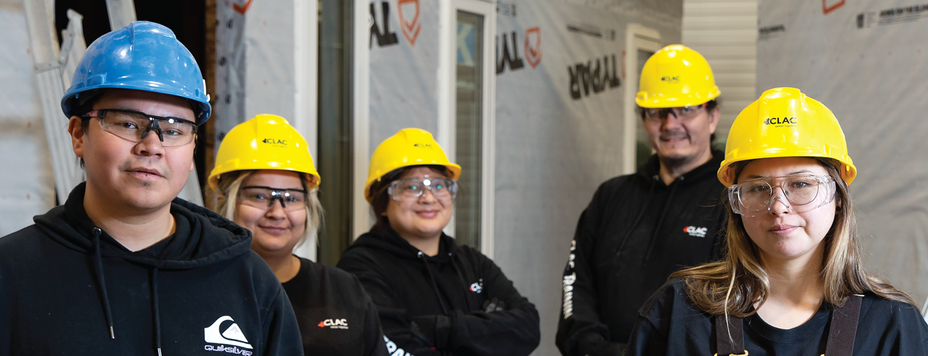 five students in hard hats