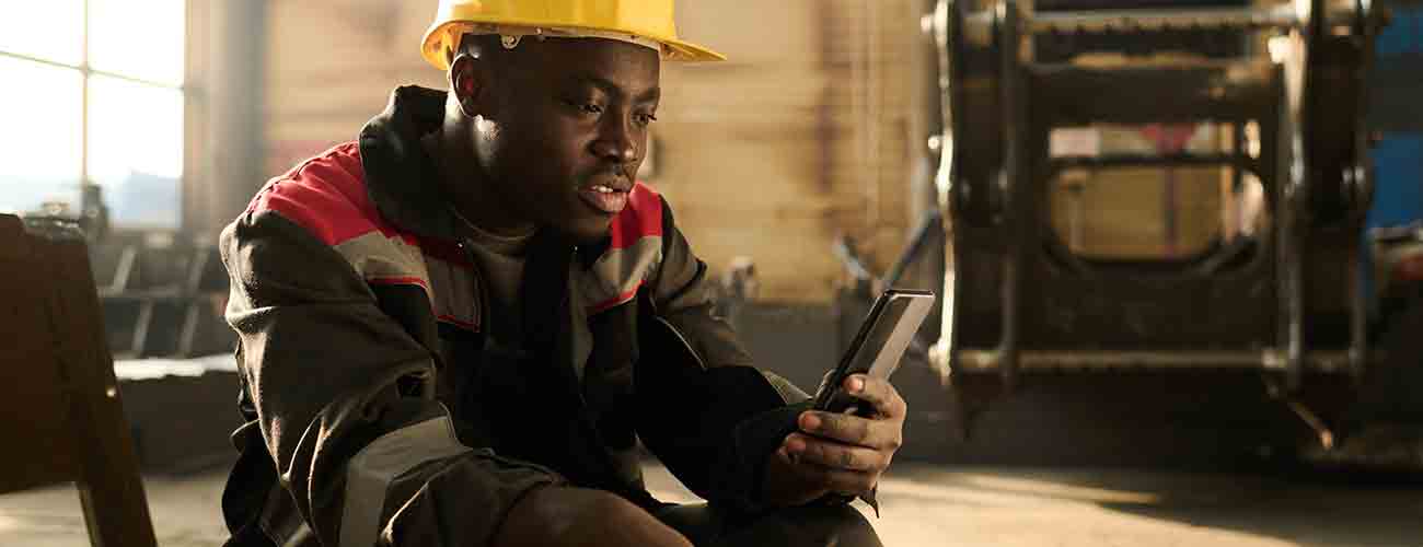 construction worker on his phone