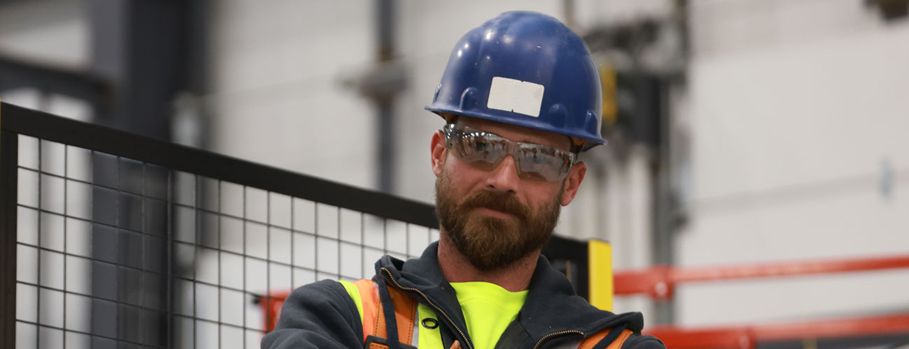 service worker standing in front of candy
