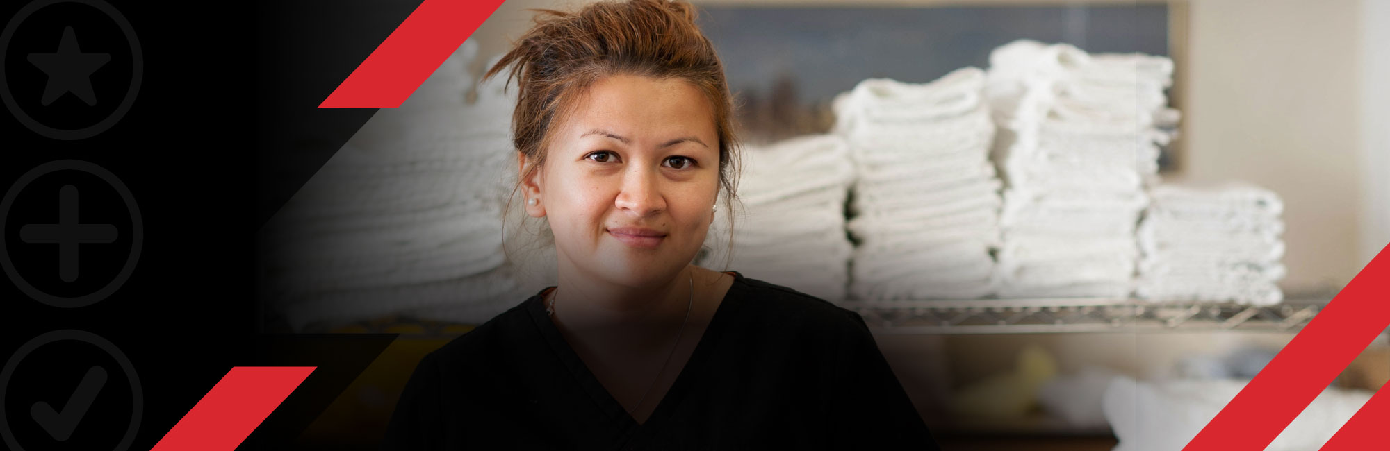 Two hospitality workers smiling