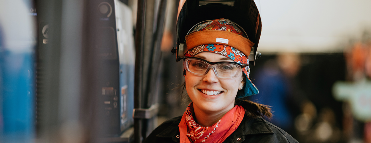 woman in welding bay