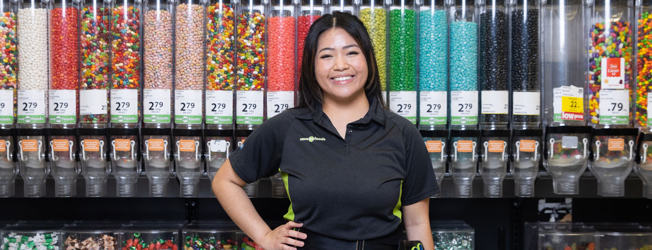 service worker standing in front of candy