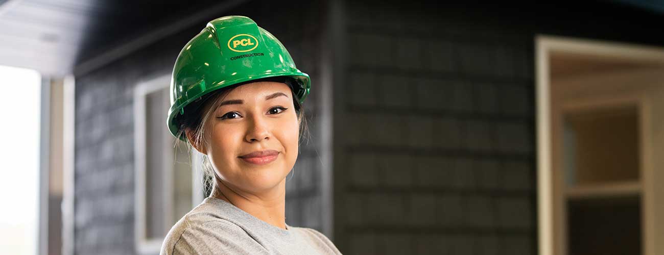 woman in a hardhat on site