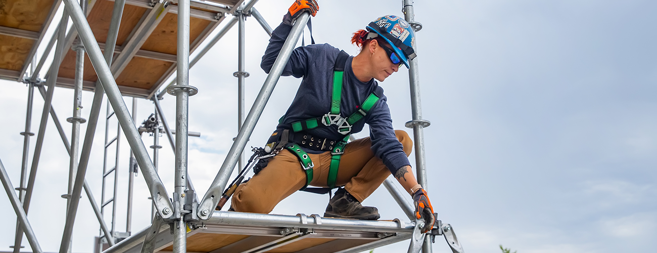woman on scaffolding