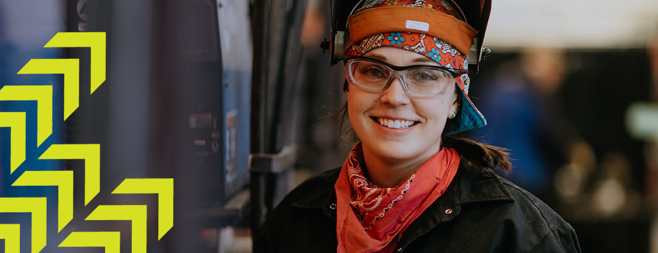 woman in a welding bay