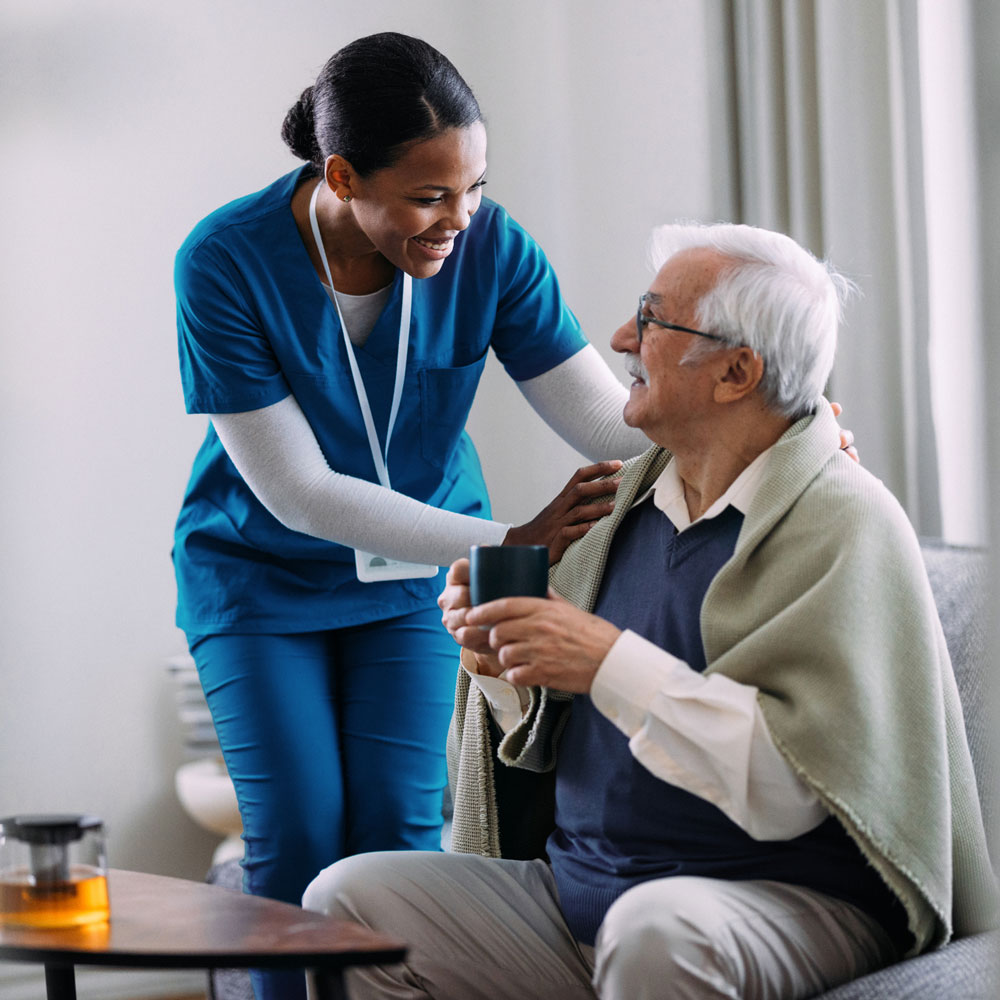 healthcare worker helping patient